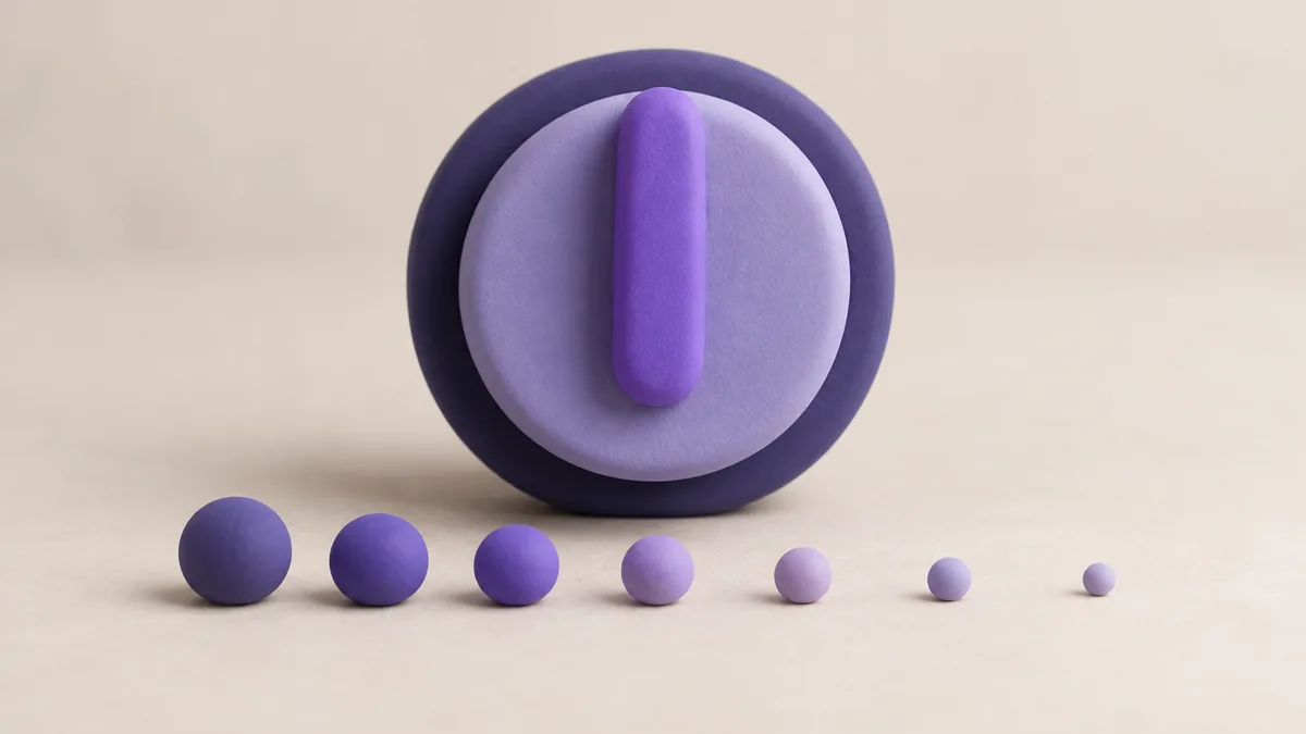 A large clay dial knob beside a row of small clay balls that get smaller from left to right, like comments being turned down