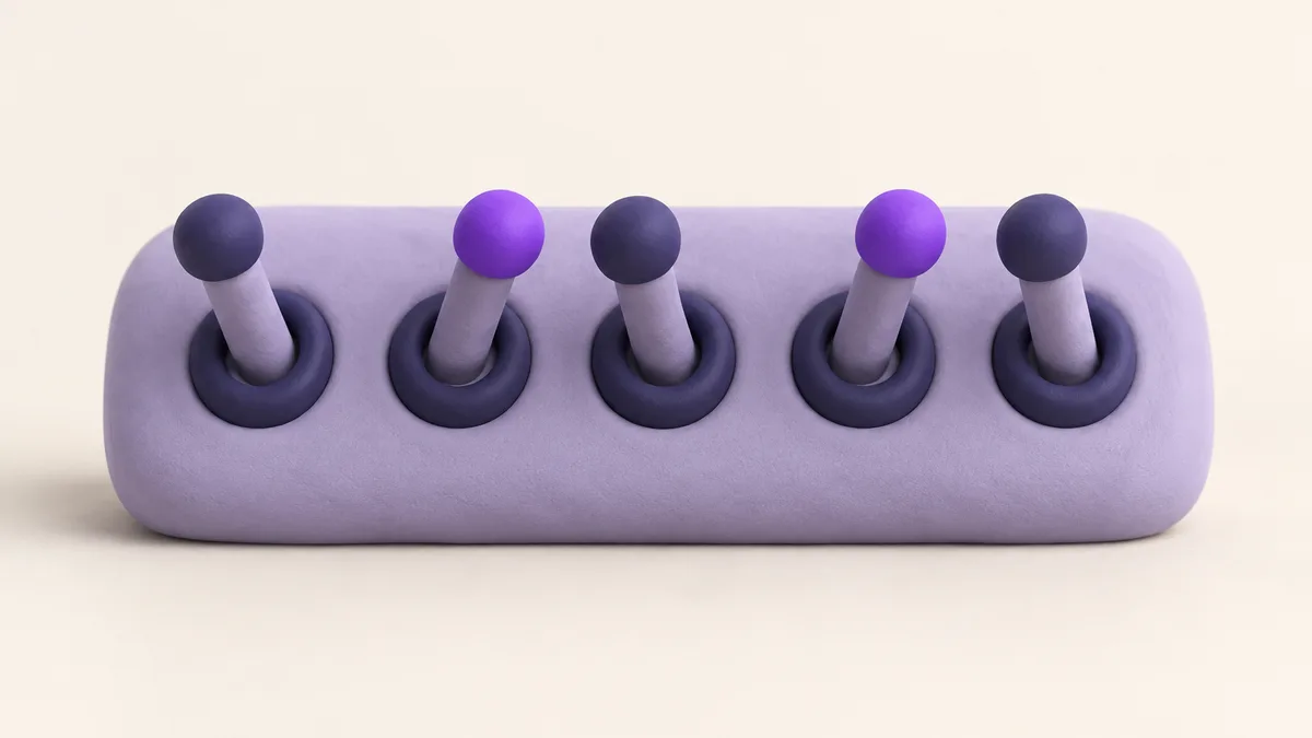 Five chunky clay toggle levers on a rounded block, two of them flipped to the right with violet tips