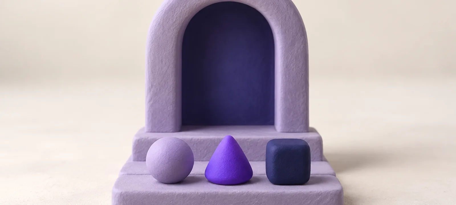 A small clay archway with three rounded clay tokens of different shapes waiting on a step in front of it