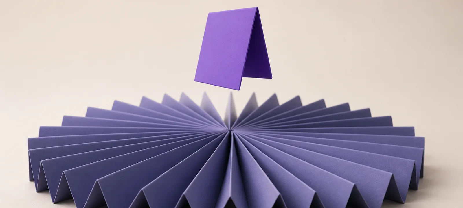 One folded paper note lifted above a wide fan of identical folded notes spreading across a pale surface, matte clay finish in muted teal and warm sand