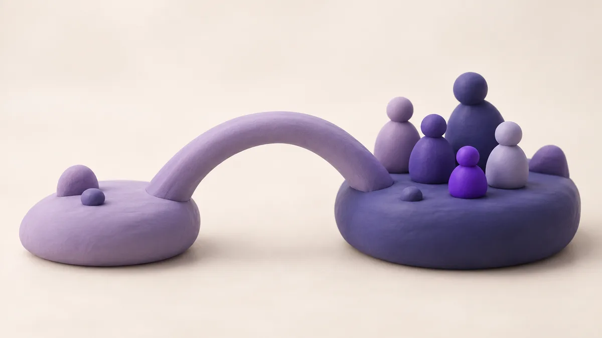A clay bridge arching between two separate smooth clay islands, a small one and a larger one with several small figures on it
